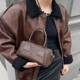 NAMCOVERSE 2025Niche design retro simple vegetable tanned cowhide long handle underarm baguette bag sugar triangle underarm bag shoulder women's bag