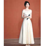 2025 One-word shoulder evening dress light luxury high sense banquet satin host art test dress temperament celebrity long dress spring
