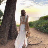 2025 Seaside vacation dress women's atmosphere pure desire hottie deep V-neck niche sexy backless strap perspective dress