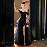 One-word shoulder black dress women's 2025 new spring high-end annual meeting host art test banquet light luxury evening dress