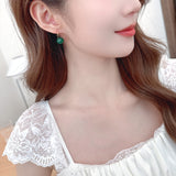 2025 New Chinese style imitation chalcedony jasper ear hook retro high-end earrings popular new temperament white earrings tide