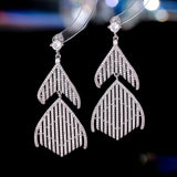 2025 temperament fishtail fringed earrings personality exaggerated gradual change micro zircon super flash luxury creative long earrings
