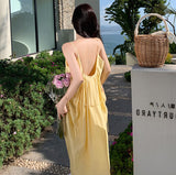 Style Yellow Gallus Dress Loose and Lazy Style Summer 2024 New Backless Sexy Light Yellow Dress