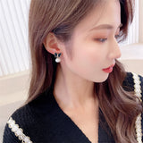 2025 欧美跨境气质蝴蝶耳环珍珠耳环女s925银针小众设计感时尚个性耳饰