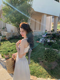 2025 Summer seaside vacation photo gentle temperament vacation design sense dating waist suspender strap backless dress women