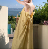 Style Yellow Gallus Dress Loose and Lazy Style Summer 2024 New Backless Sexy Light Yellow Dress