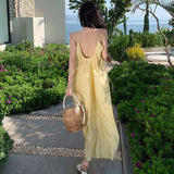 Style Yellow Gallus Dress Loose and Lazy Style Summer 2024 New Backless Sexy Light Yellow Dress