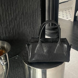 NAMCOVERSE 2025Niche design retro simple vegetable tanned cowhide long handle underarm baguette bag sugar triangle underarm bag shoulder women's bag