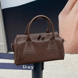 NAMCOVERSE 2025Niche design retro simple vegetable tanned cowhide long handle underarm baguette bag sugar triangle underarm bag shoulder women's bag