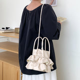 NAMCOVERSE 2025 Korean version of the new pleated ruffle edge soft leather portable underarm bag design petal skirt bag shoulder messenger bag women